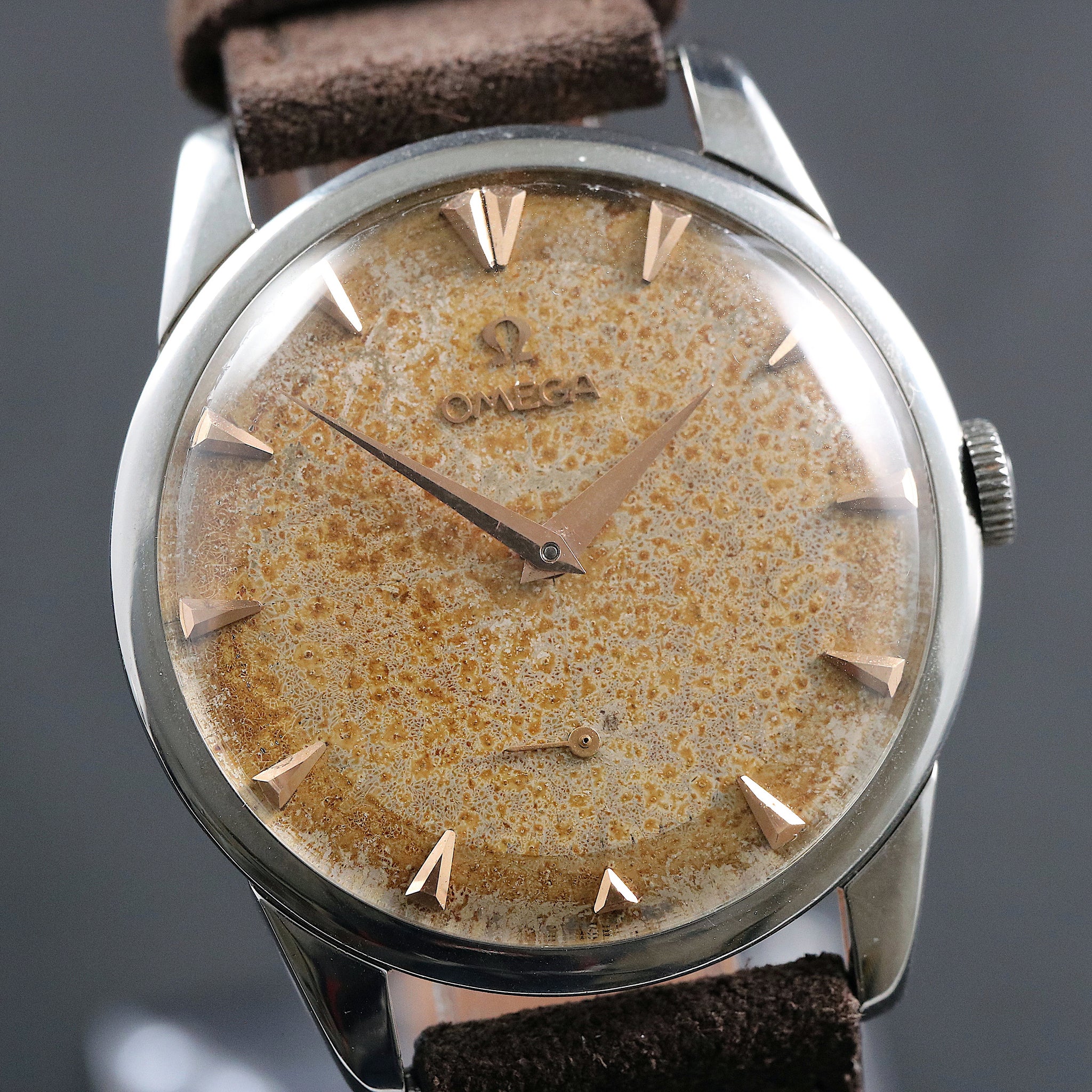Omega 2748 with amazing patina dial from 1954 in stainless steel