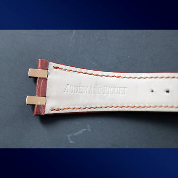 Audemars Piguet 18K gold deployment buckle clasp with brown alligator strap