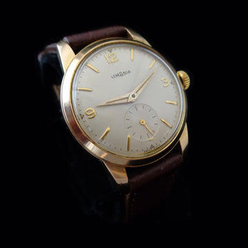 Lemania 32mm in gold and stainless steel from the 1950’s with caliber 3000