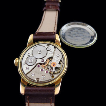 Lemania 32mm in gold and stainless steel from the 1950’s with caliber 3000