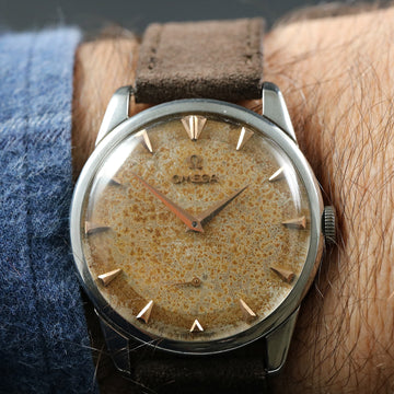 Omega 2748 with amazing patina dial from 1954 in stainless steel with caliber 266