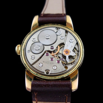 Lemania 32mm in gold and stainless steel from the 1950’s with caliber 3000