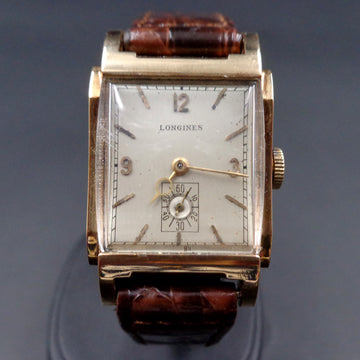 Longines in 14K yellow gold with dome crystal and caliber 9L from 1949