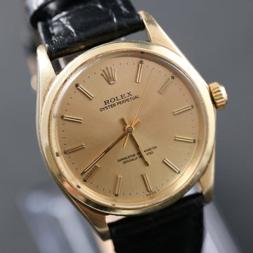Rolex Oyster Perpetual in 14K YG with ref 1002 from 1970 with gold dial and caliber 1570