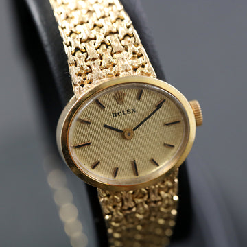 Rolex with Ref 8215 in 14K yellow gold with caliber 1400 from 1970’s