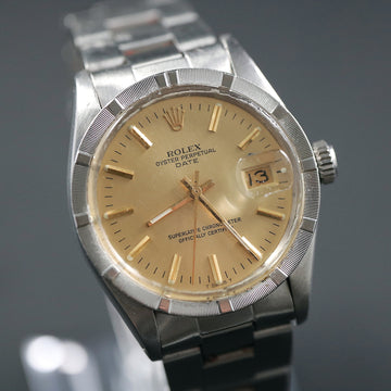 Rolex Oyster Perpetual Date Engine Turned Bezel with ref 1500 from 1974 with caliber 1570
