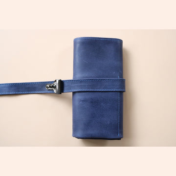 A High end handcrafted leather watch pouch in blue aged patina style leather with LFW logo
