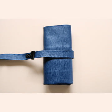 A High end handcrafted leather watch pouch in blue grain leather with LFW logo