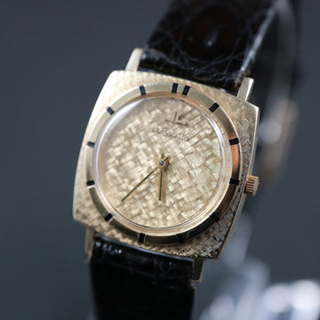 Lecoultre with ref 7511 in 14k YG with movement 818