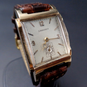 Longines in 14K yellow gold with dome crystal and caliber 9L from 1949