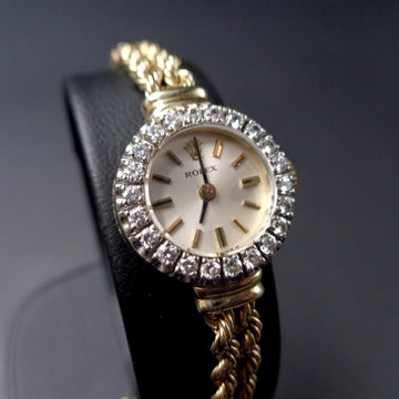 Rolex with Ref 8418 in 14K yellow gold with caliber 1400 from 1957