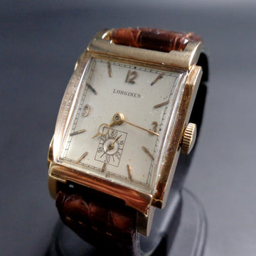Longines in 14K yellow gold with dome crystal and caliber 9L from 1949
