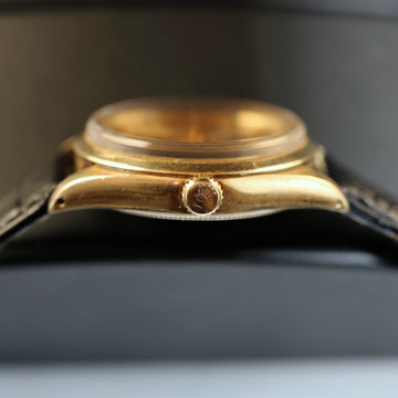 Rolex Oyster Perpetual in 14K YG with ref 1002 from 1970 with gold dial and caliber 1570