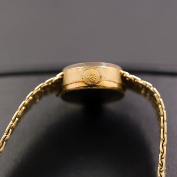 Rolex with Ref 8215 in 14K yellow gold with caliber 1400 from 1970’s