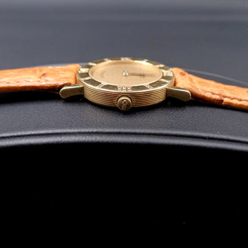 Corum Romulus with diamonds bezel in 18K yellow gold