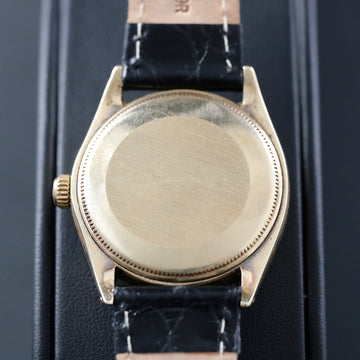 Rolex Oyster Perpetual in 14K YG with ref 1002 from 1970 with gold dial and caliber 1570