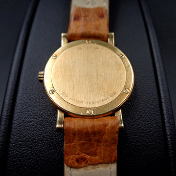 Corum Romulus with diamonds bezel in 18K yellow gold