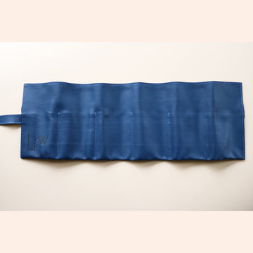 A High end handcrafted leather watch pouch in blue grain leather with LFW logo