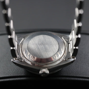 Rolex Oyster Perpetual Date Engine Turned Bezel with ref 1500 from 1974 with caliber 1570