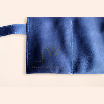 A High end handcrafted leather watch pouch in blue aged patina style leather with LFW logo