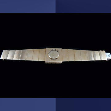 Beautiful Omega Secret watch in 18K solid yellow gold from 1960 with manual wind movement