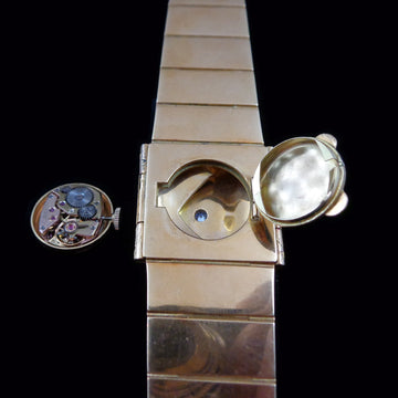 Beautiful Omega Secret watch in 18K solid yellow gold from 1960 with manual wind movement
